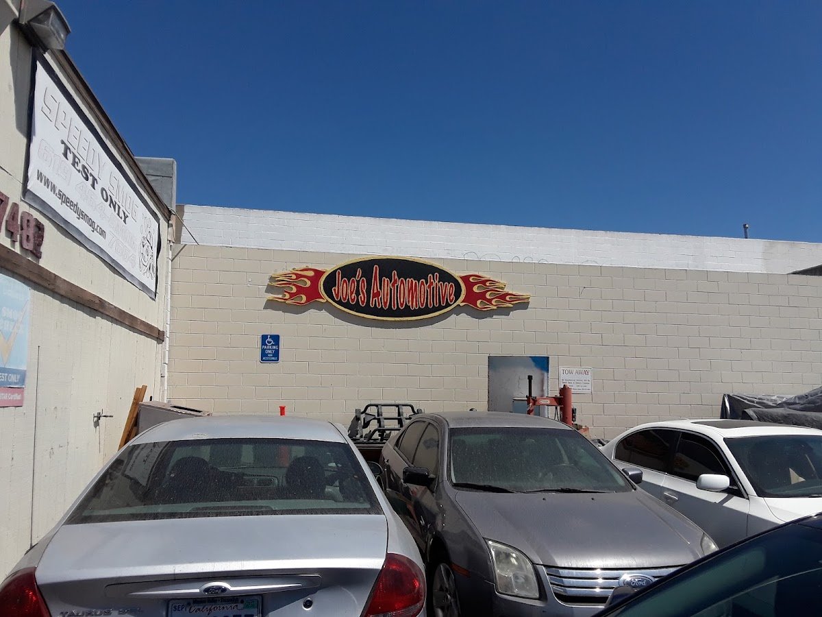 Speedy Smog Test Only banner on the building at 7482 El Cajon Blvd